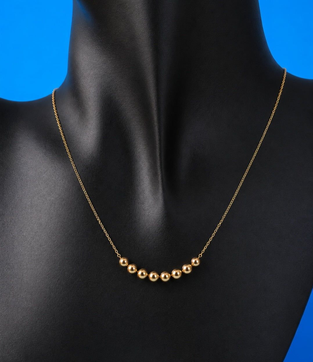 Collar de Oro 18K con 8 bolitas en Arco Oro 18k